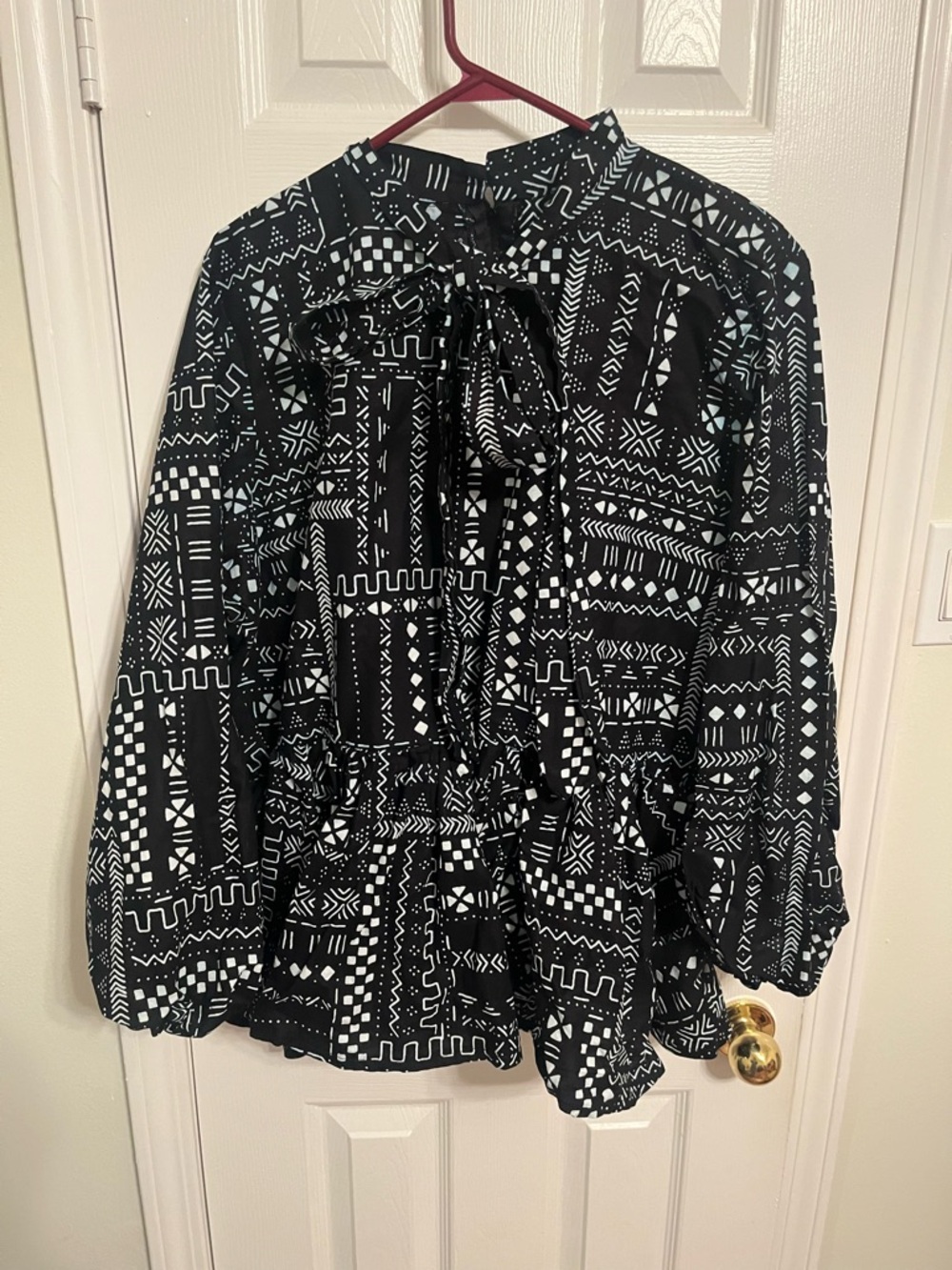 Mae Otti Black & White Patterned Tie-Neck Peplum Blouse